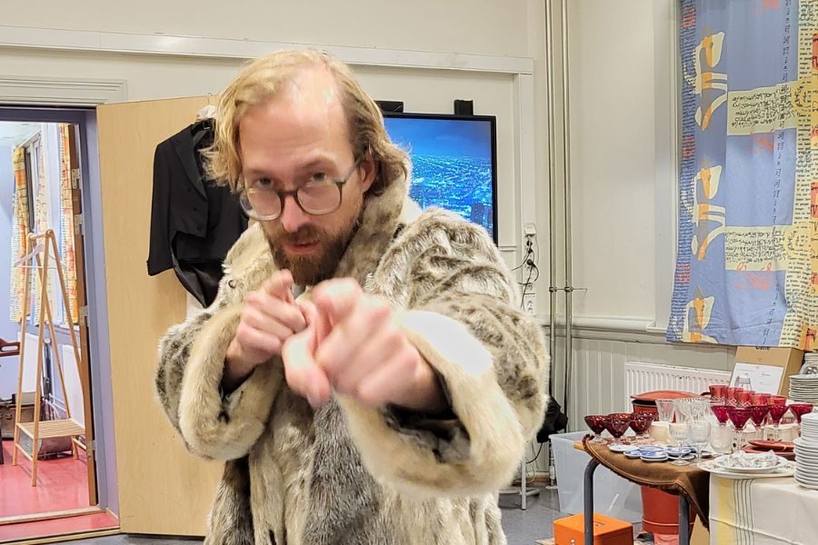 mann i pelskåpe